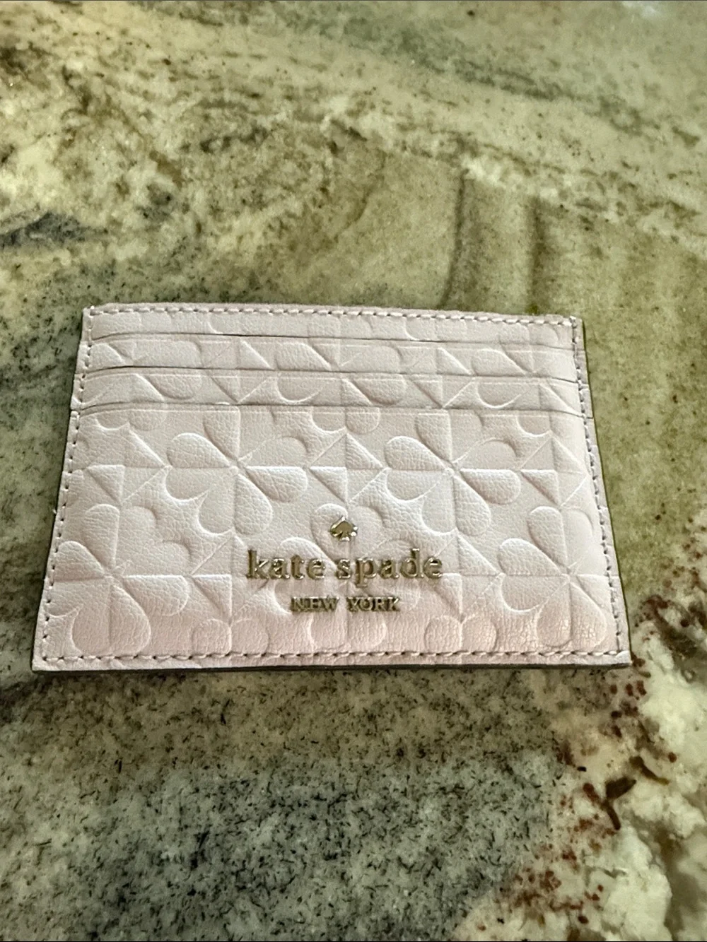 Kate Spade Light Lavender embossed floral card case with gold logo